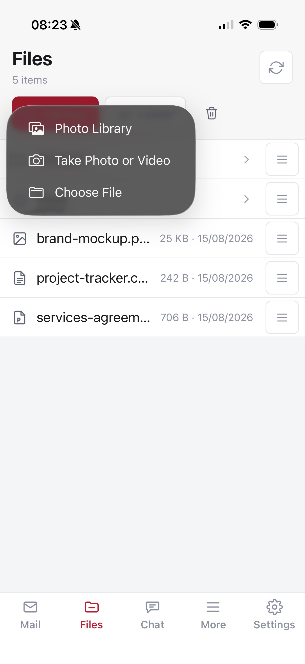 Files on the iPhone with the upload menu open: Photo Library, Take Photo or Video, Choose File